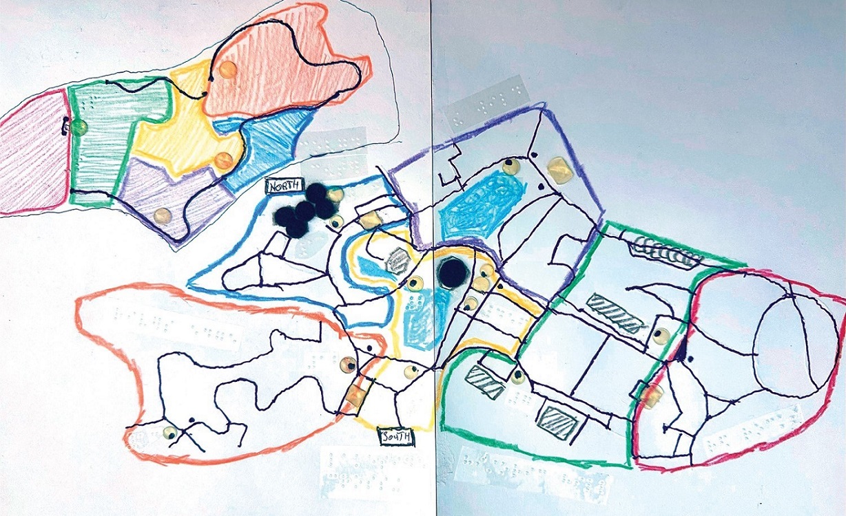 A colorful map of a zoo drawn on two sheets of taped-together braille paper. The different regions are outlined with colored crayon and have adhesive braille labels. Some of the regions have other details, including blue crayon regions (water) and various bump dots (fuzzy black, square pyramidal clear, and small round clear).